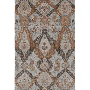 Photo of Rust Charcoal And Beige Ikat Washable Area Rug With UV Protection