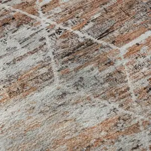 Photo of Rust Copper And Ivory Geometric Washable Area Rug With UV Protection