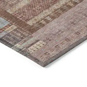 Photo of Rust Coral And Beige Striped Washable Indoor Outdoor Area Rug