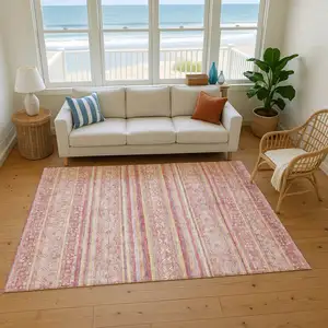 Photo of Rust Coral And Wheat Striped Washable Area Rug With UV Protection