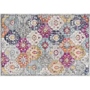 Photo of Rust Distressed Floral Area Rug