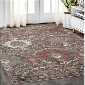 Photo of Rust Floral Stain Resistant Area Rug