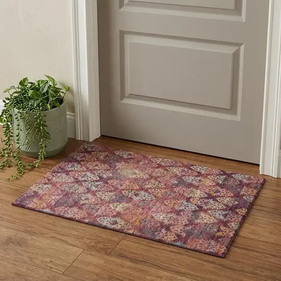 Rust Gold And Gray Ikat Washable Area Rug With UV Protection Photo 1