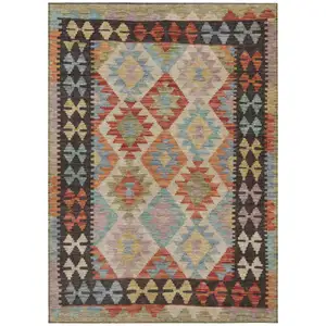 Photo of Rust Gold And Orange Tribal Washable Indoor Outdoor Area Rug