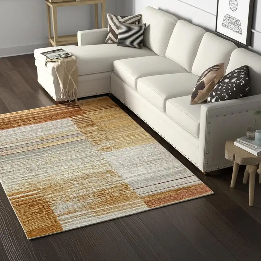 Rust Gold Blue Grey Ivory And Tan Geometric Power Loom Stain Resistant Area Rug With Fringe Photo 1