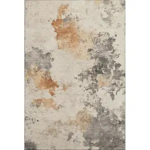 Photo of Rust Gray And Ivory Abstract Washable Area Rug With UV Protection