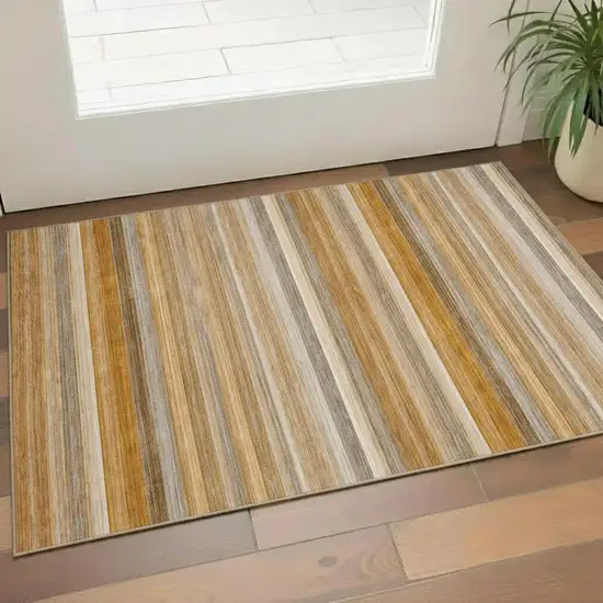 Rust Gray And Ivory Striped Washable Area Rug With UV Protection Photo 1