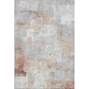 Photo of Rust Gray And Silver Abstract Washable Area Rug With UV Protection
