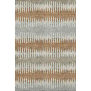 Photo of Rust Gray And Silver Striped Washable Area Rug With UV Protection
