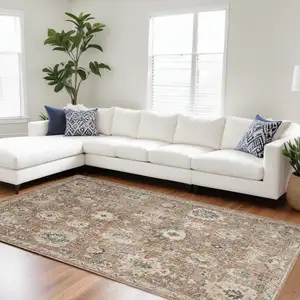 Photo of Rust Green And Black Floral Distressed Area Rug