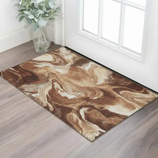 Rust Ivory And Beige Abstract Washable Area Rug With UV Protection Photo 1