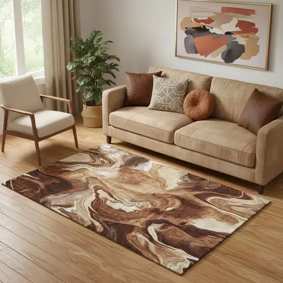 Rust Ivory And Beige Abstract Washable Area Rug With UV Protection Photo 1
