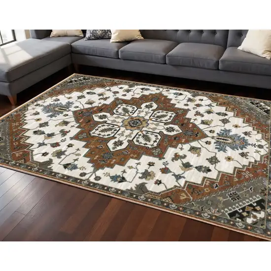 Rust Ivory And Black Medallion Area Rug With Fringe Photo 1