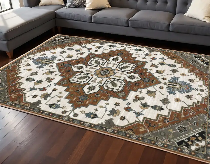 Rust Ivory And Black Medallion Area Rug With Fringe Photo 1