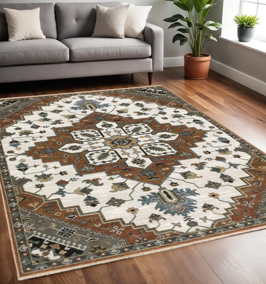 Rust Ivory And Black Medallion Area Rug With Fringe Photo 1