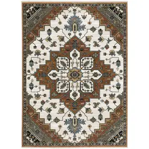 Photo of Rust Ivory And Black Medallion Area Rug With Fringe