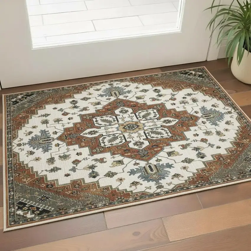 Rust Ivory And Black Medallion Area Rug With Fringe Photo 1