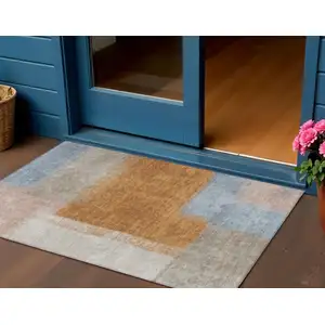 Photo of Rust Ivory And Blue Abstract Washable Indoor Outdoor Area Rug