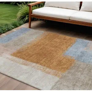 Photo of Rust Ivory And Blue Abstract Washable Indoor Outdoor Area Rug