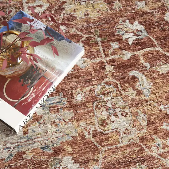 Rust Ivory And Blue Geometric Distressed Area Rug Photo 9