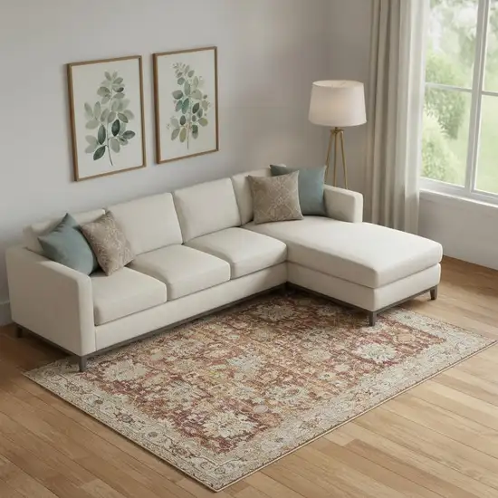 Rust Ivory And Blue Geometric Distressed Area Rug Photo 1