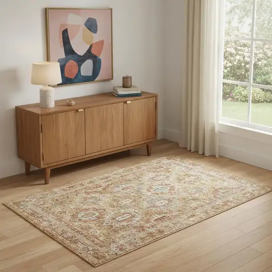 Rust Ivory And Blue Geometric Distressed Area Rug Photo 1