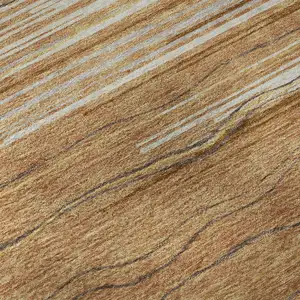 Photo of Rust Ivory And Gold Striped Washable Area Rug With UV Protection