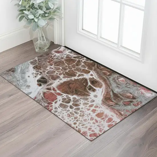 Rust Ivory And Gray Abstract Washable Area Rug With UV Protection Photo 1