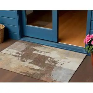 Photo of Rust Ivory And Gray Abstract Washable Indoor Outdoor Area Rug