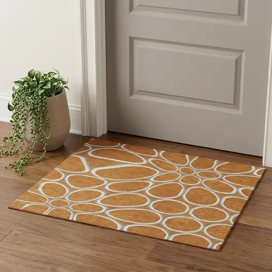 Rust Ivory And Gray Geometric Washable Area Rug With UV Protection Photo 1