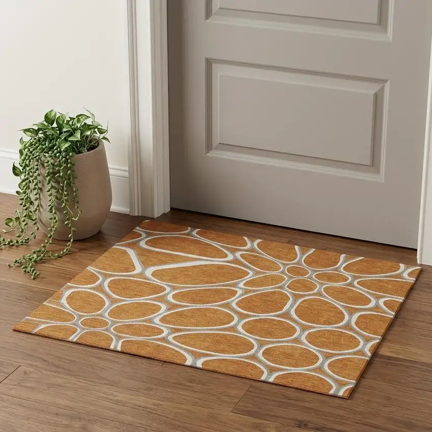 Rust Ivory And Gray Geometric Washable Area Rug With UV Protection Photo 1