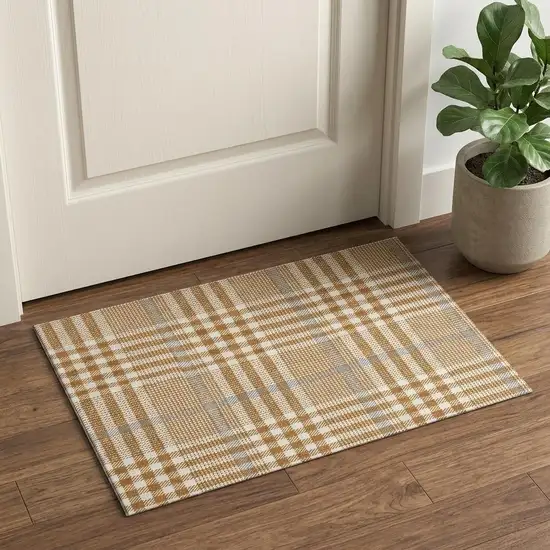 Rust Ivory And Gray Plaid Washable Area Rug With UV Protection Photo 1