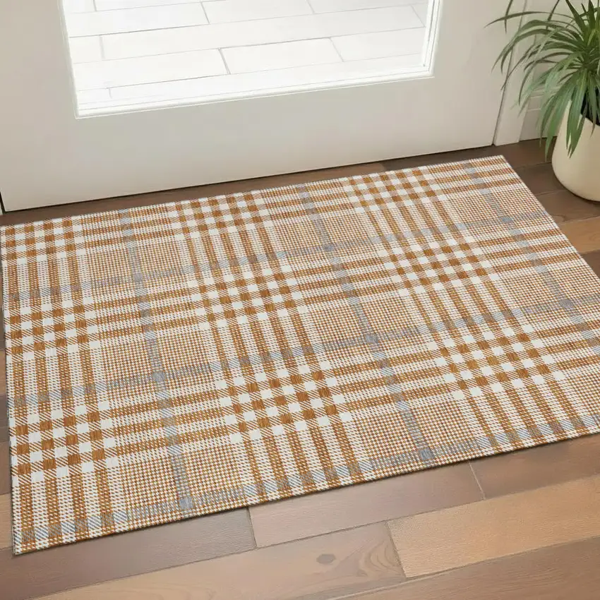 Rust Ivory And Gray Plaid Washable Area Rug With UV Protection Photo 1