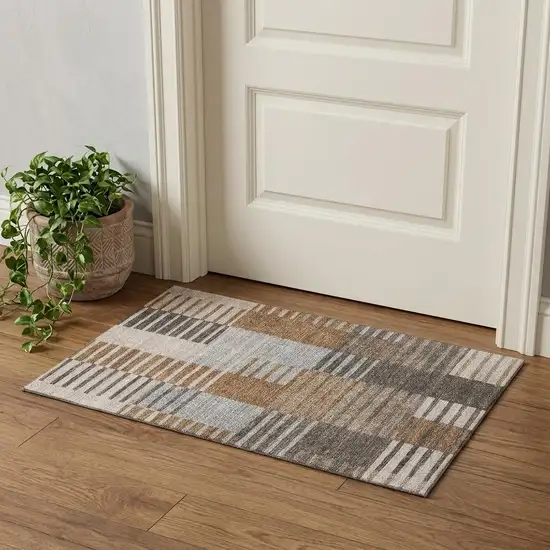 Rust Ivory And Gray Striped Washable Area Rug With UV Protection Photo 1