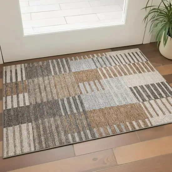 Rust Ivory And Gray Striped Washable Area Rug With UV Protection Photo 1