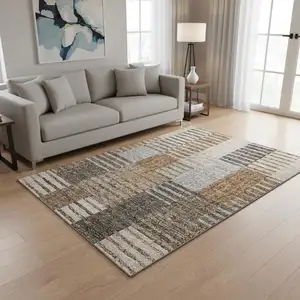 Photo of Rust Ivory And Gray Striped Washable Area Rug With UV Protection