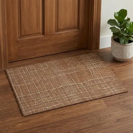 Rust Ivory And Gray Striped Washable Area Rug With UV Protection Photo 1