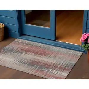 Photo of Rust Ivory And Gray Striped Washable Indoor Outdoor Area Rug