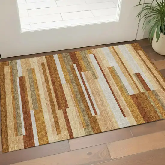 Rust Ivory And Taupe Striped Washable Area Rug With UV Protection Photo 1