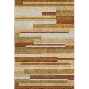 Photo of Rust Ivory And Taupe Striped Washable Area Rug With UV Protection