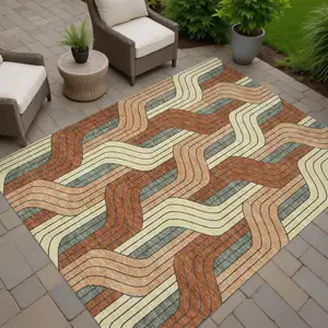 Photo of Rust Orange And Wheat Striped Washable Indoor Outdoor Area Rug