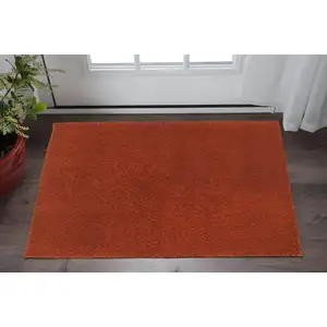 Photo of Rust Red Shag Tufted Handmade Stain Resistant Area Rug