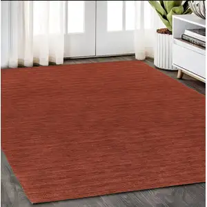 Photo of Rust Wool Hand Tufted Area Rug