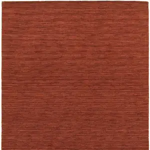 Photo of Rust Wool Hand Tufted Area Rug