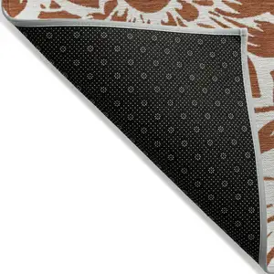 Photo of Rust and Ivory Floral Washable Non Skid Indoor Outdoor Area Rug