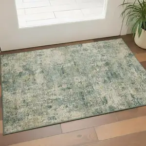 Photo of Sage And Beige Abstract Washable Area Rug With UV Protection