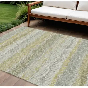 Photo of Sage And Gold Abstract Washable Indoor Outdoor Area Rug