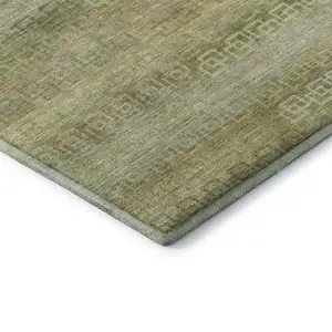 Photo of Sage And Gold Striped Washable Area Rug With UV Protection