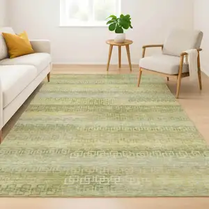 Photo of Sage And Gold Striped Washable Area Rug With UV Protection
