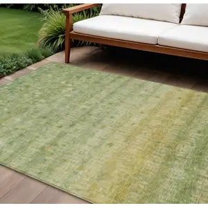 Photo of Sage And Gold Striped Washable Indoor Outdoor Area Rug